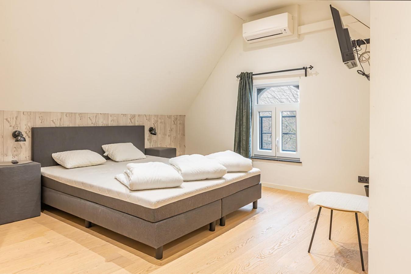 Guesthouses By Hotel Van Eyck Maaseik Esterno foto